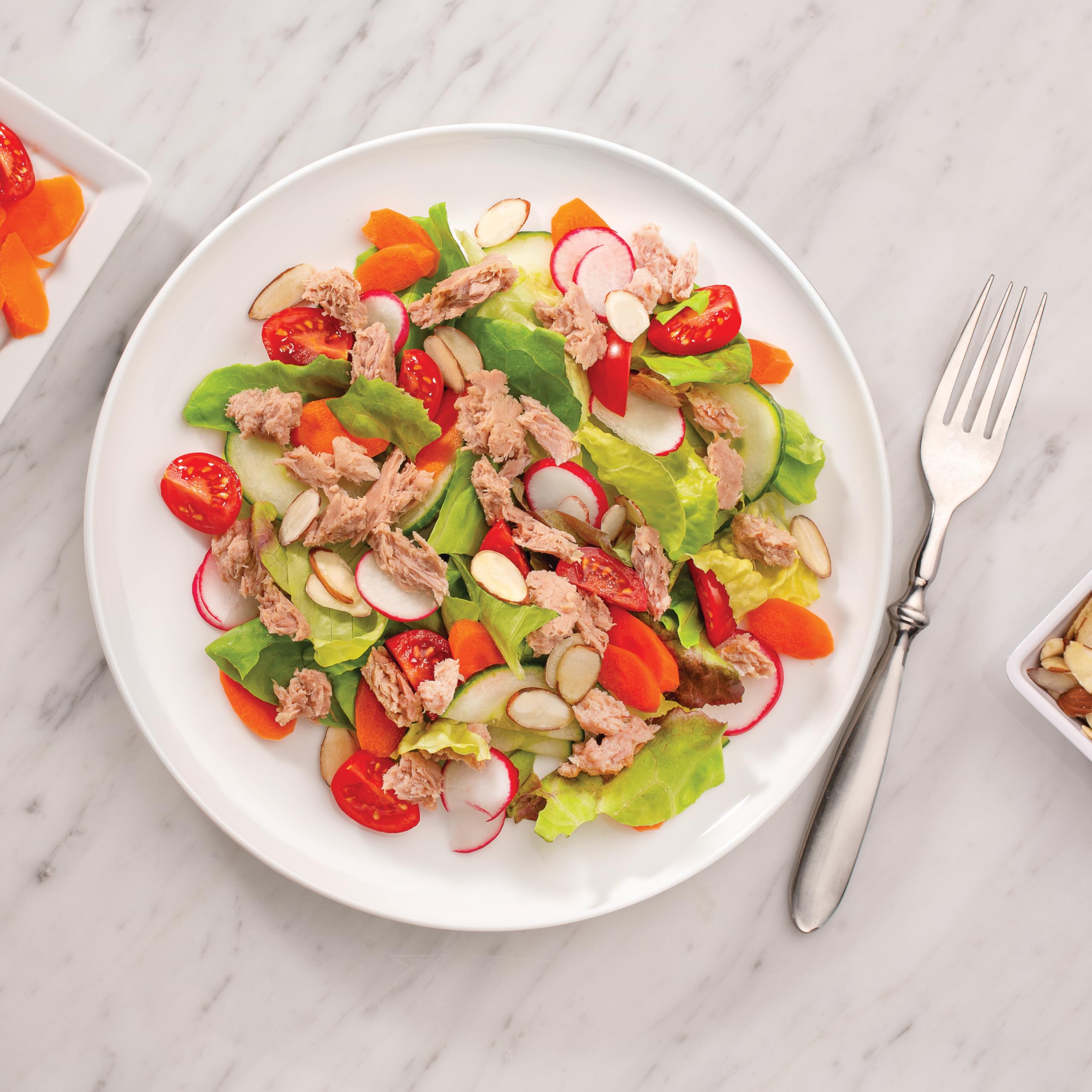 StarKist pouch atop salad bowl adding protein and easy prep