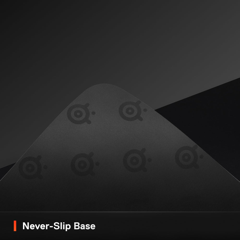 SteelSeries QcK next to keyboard to show size scale and workspace protection