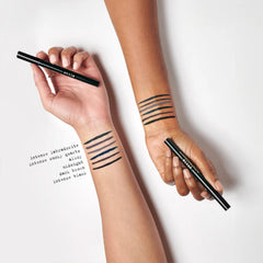 stila swiped swatch on skin demonstrating rich dark brown color payoff