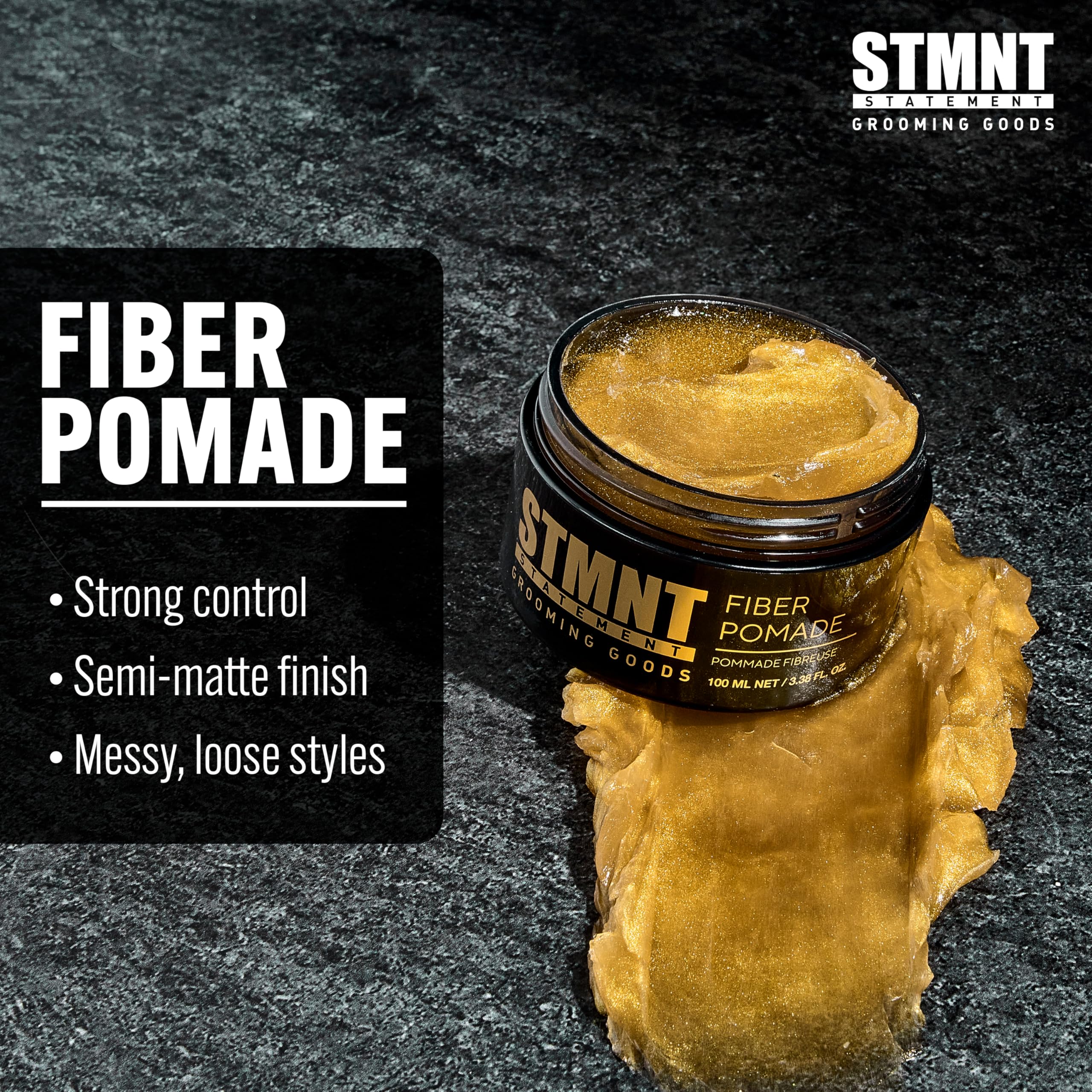 STMNT pomade on hand being warmed for smoother application and control