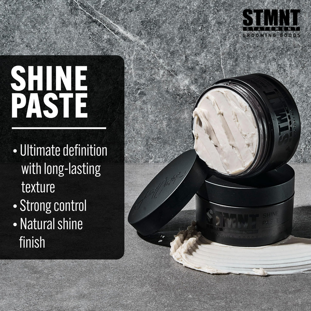 STMNT paste in hand being applied to hair, delivers strong control benefit