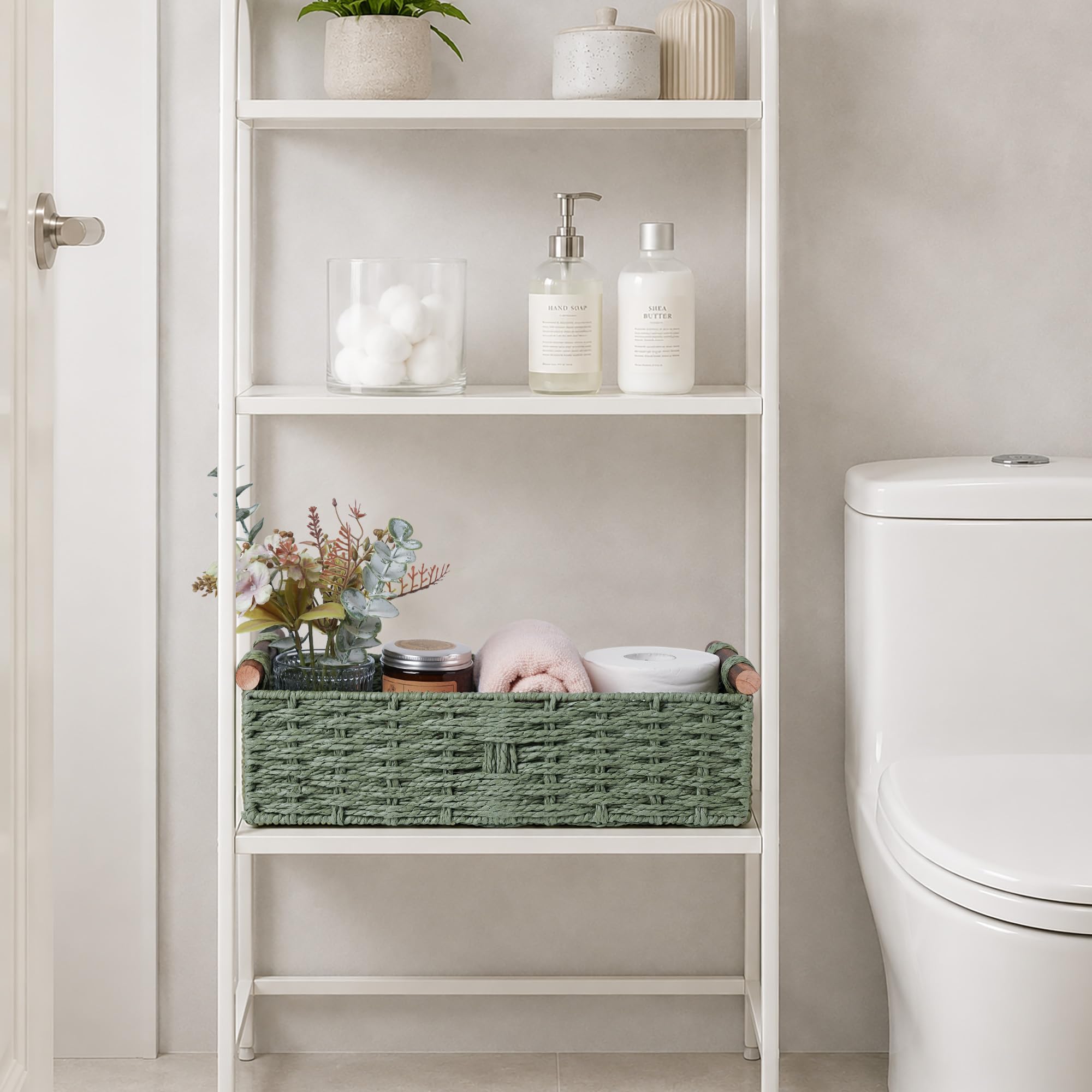 STOBSK basket next to toilet paper roll showing compact 14.5-inch capacity benefit