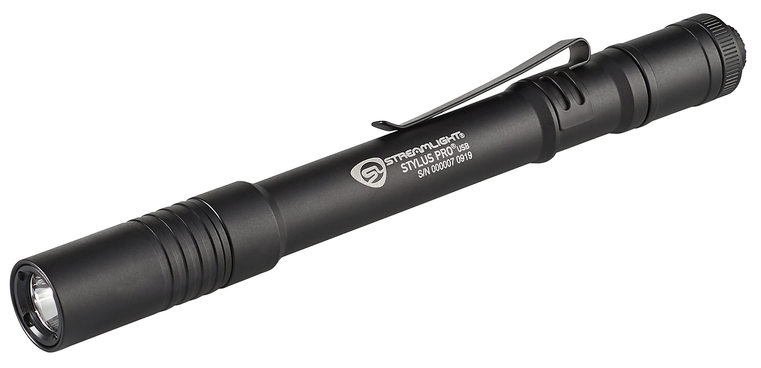 Streamlight Stylus Pro in technician's hand illuminating tight overhead conduit space