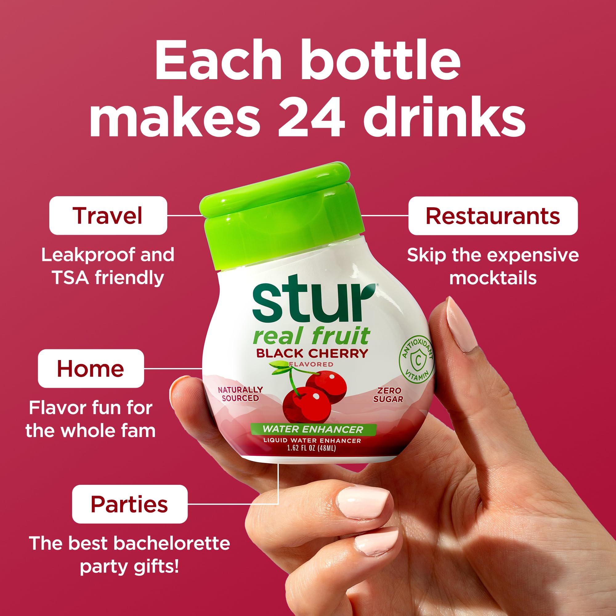 Glass of water flavored with Stur black cherry showing clear, vibrant color
