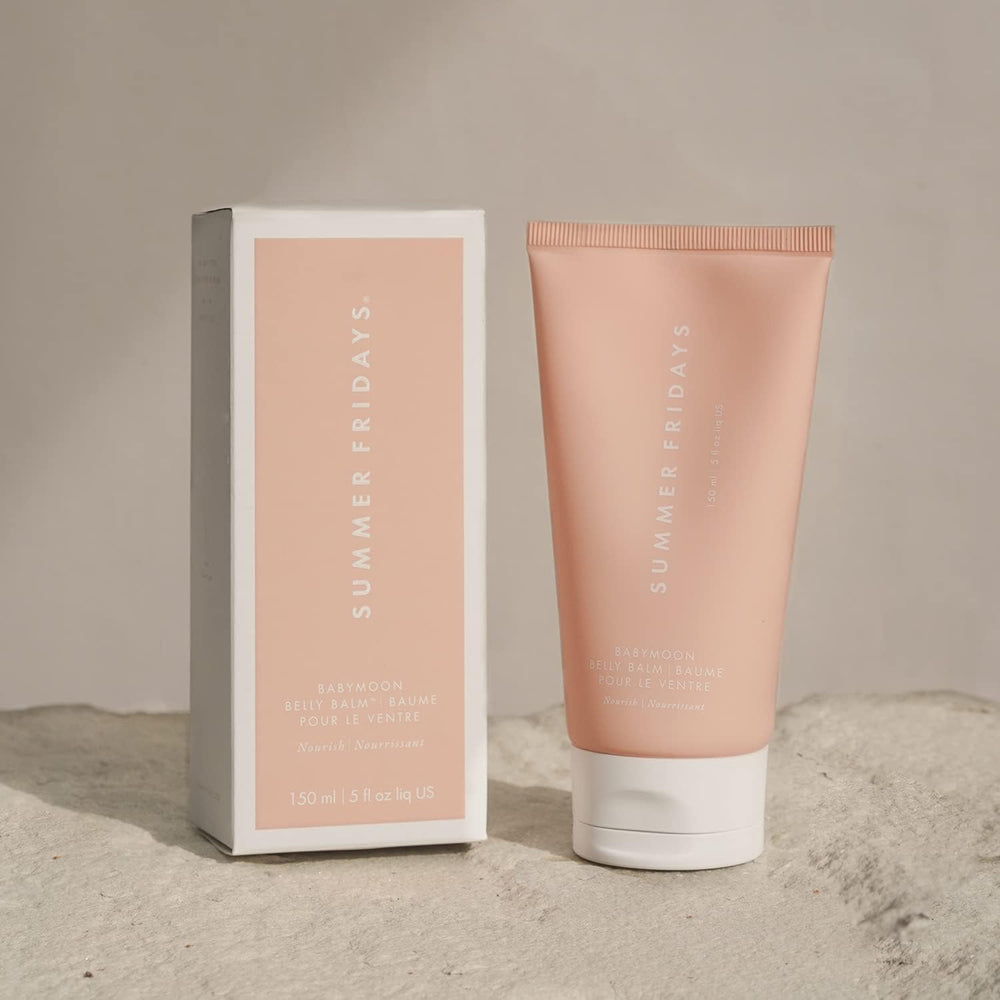Summer Fridays lifestyle image of expectant person using balm for daily care