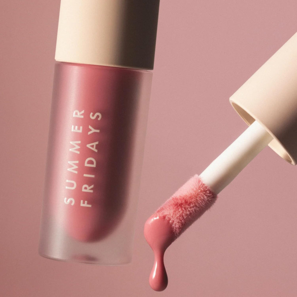 Summer Fridays on model lips demonstrating sheer rose tint and hydrated finish