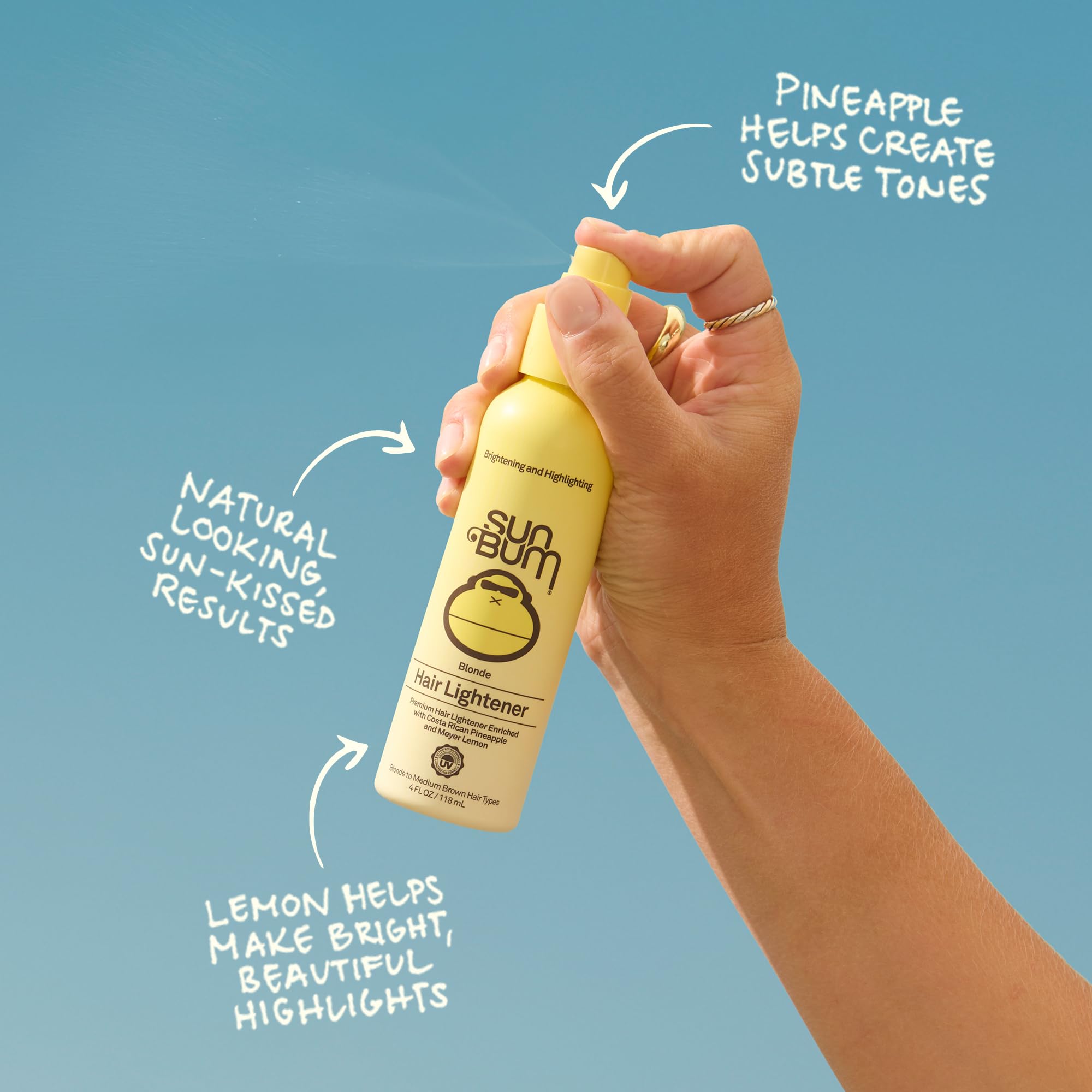 Sun Bum mist on hair strands showing lightweight texture and enhanced shine
