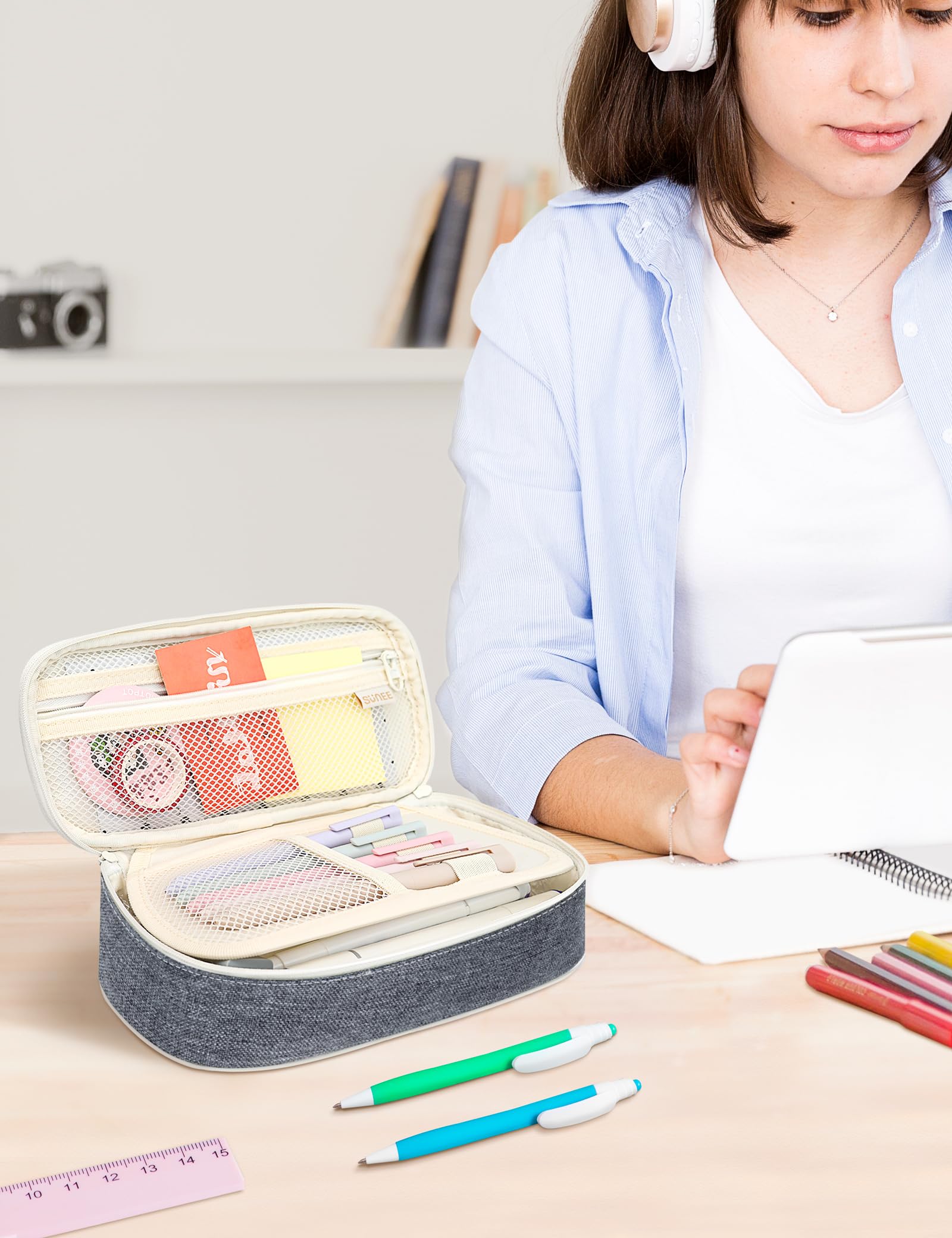 SUNEE on desk with supplies showing stylish organization and readiness