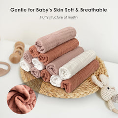 Sunny zzzZZ cloth draped over parent's shoulder protecting clothing from spit-up