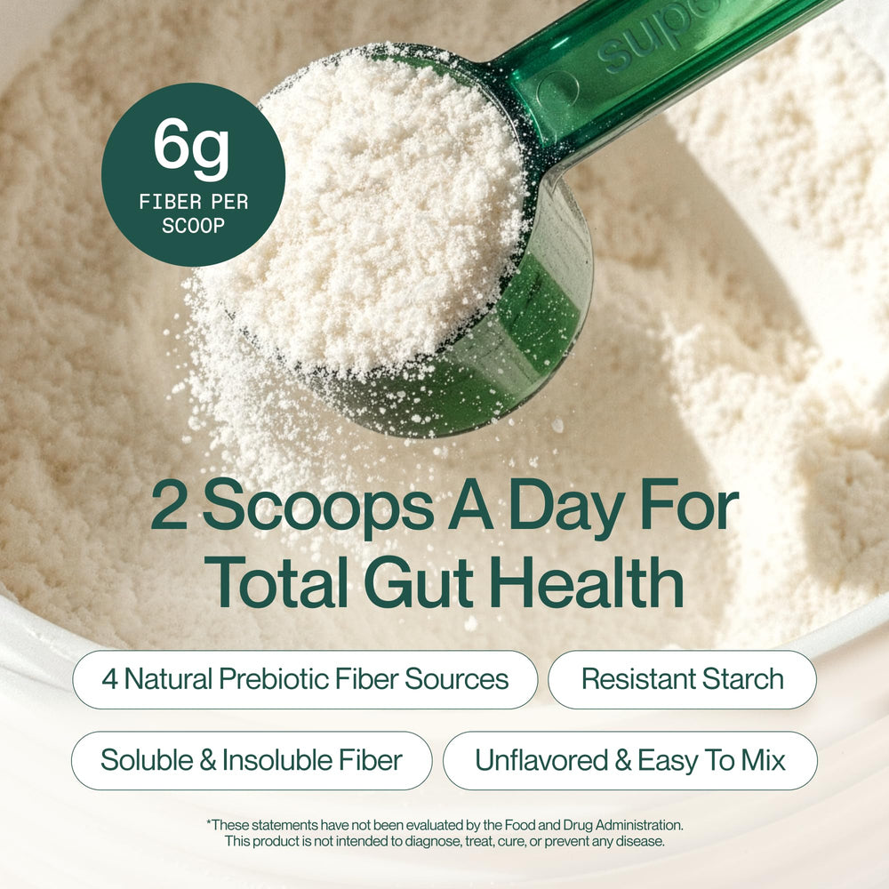 Supergut powder dissolving in glass of water, quick mixing for convenient use
