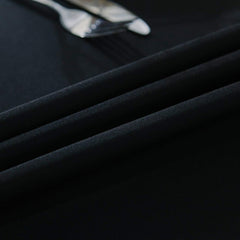 Surmente draped on 6ft table with place settings demonstrating elegant fit