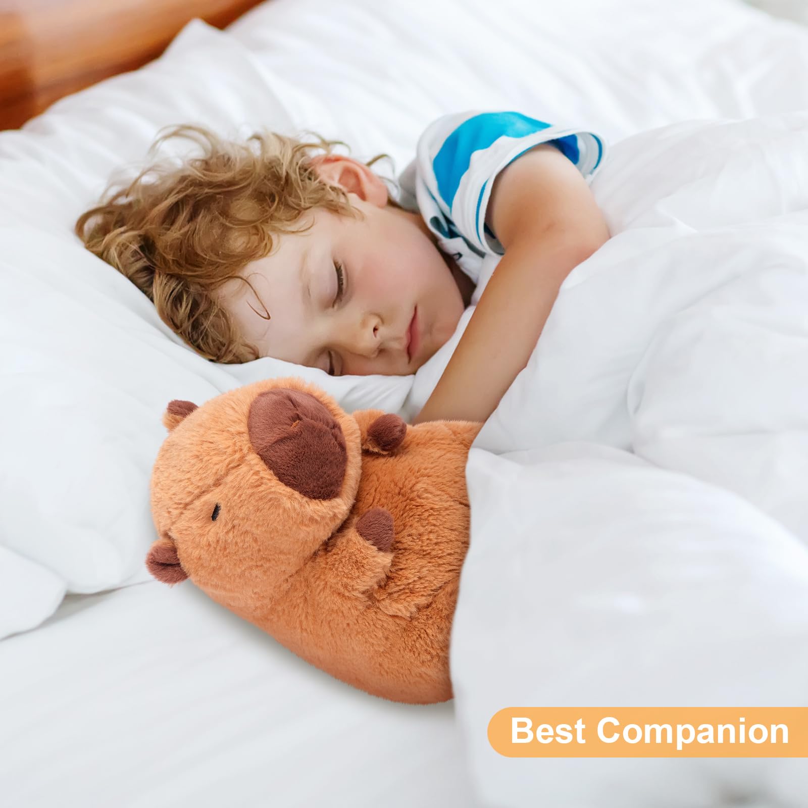 SuzziPals capybara on a bed adding cozy decor and relaxation to a bedroom