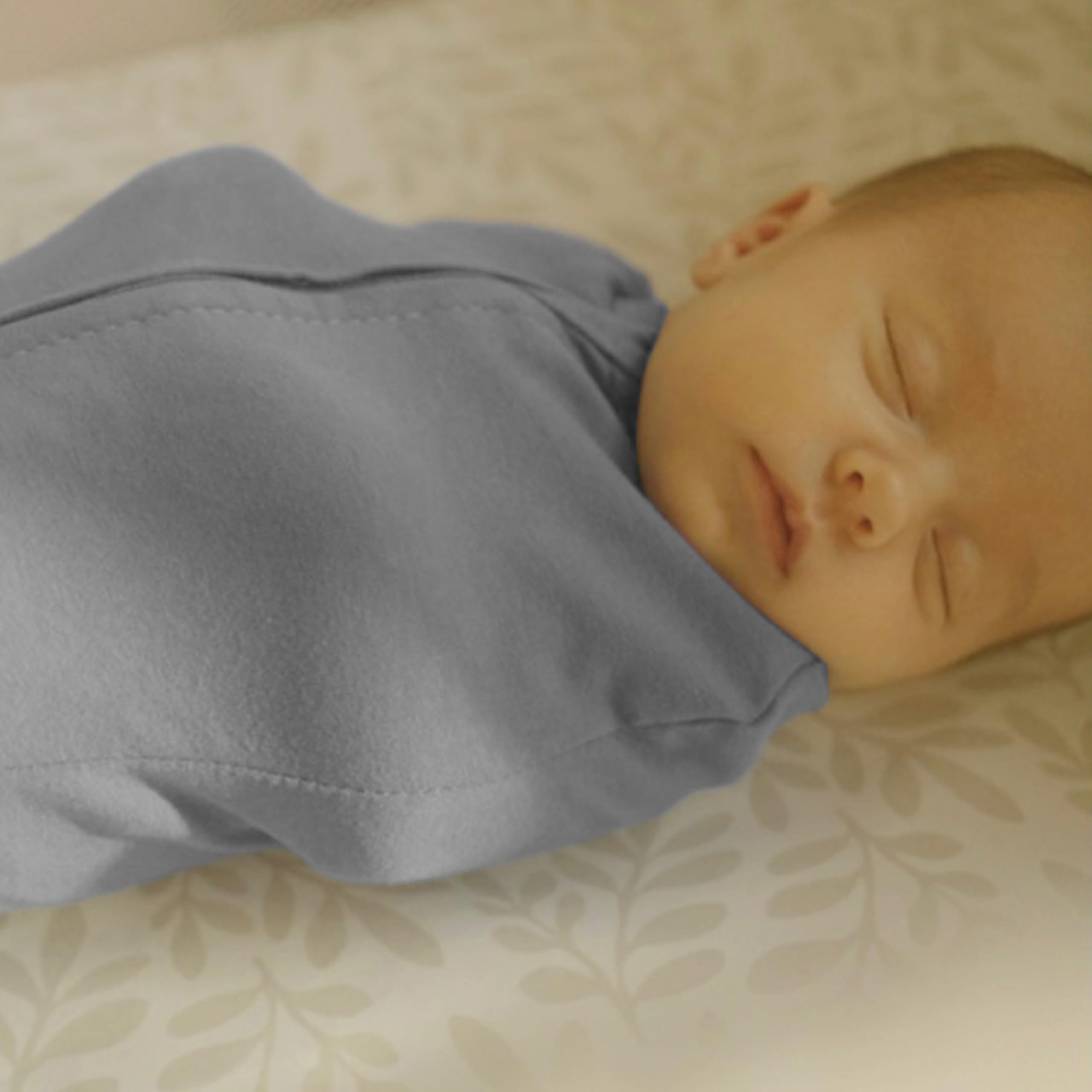 Stitching and seam detail on SwaddleMe pod showing durable construction and safety