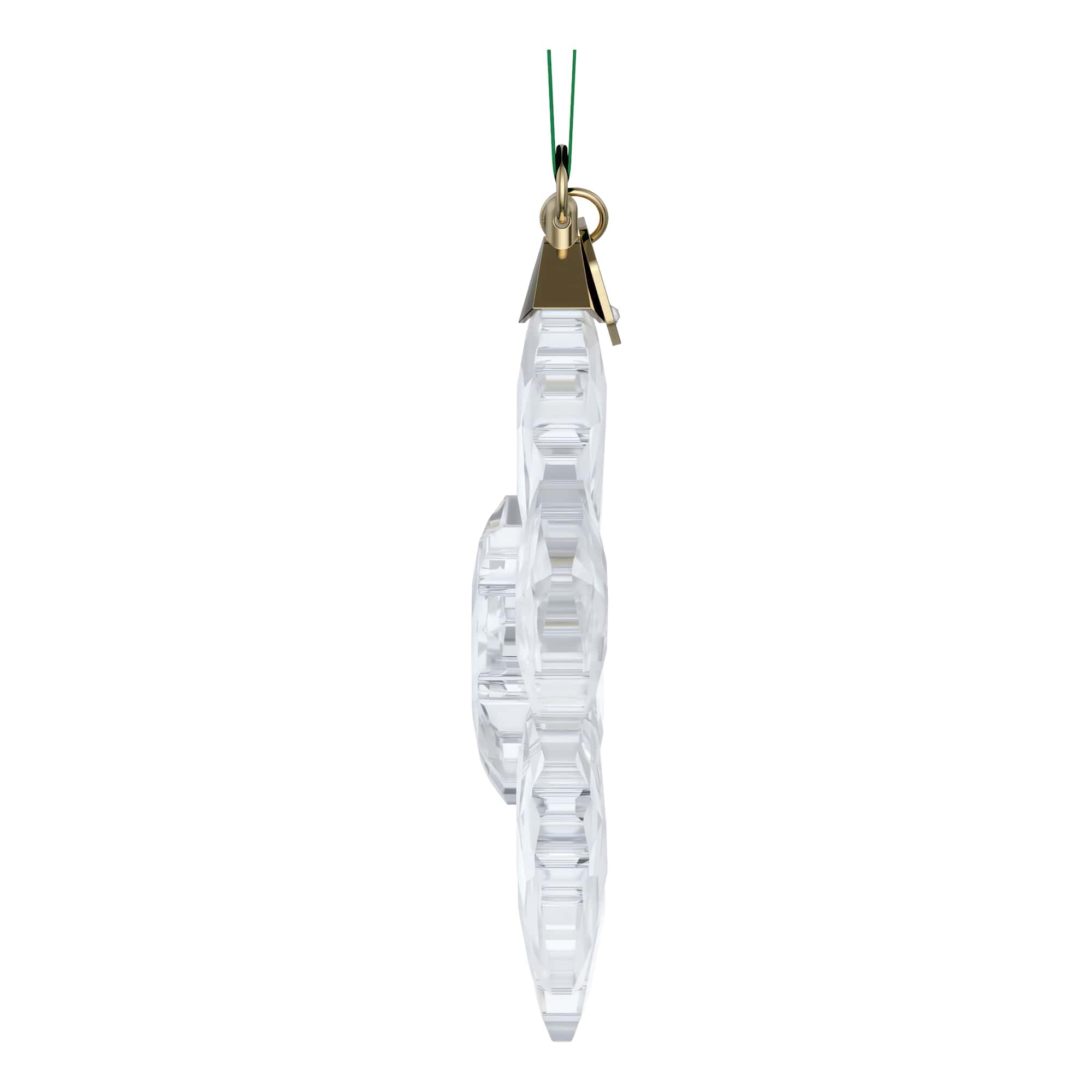 Swarovski ornament hanging in window demonstrating light-refraction benefit
