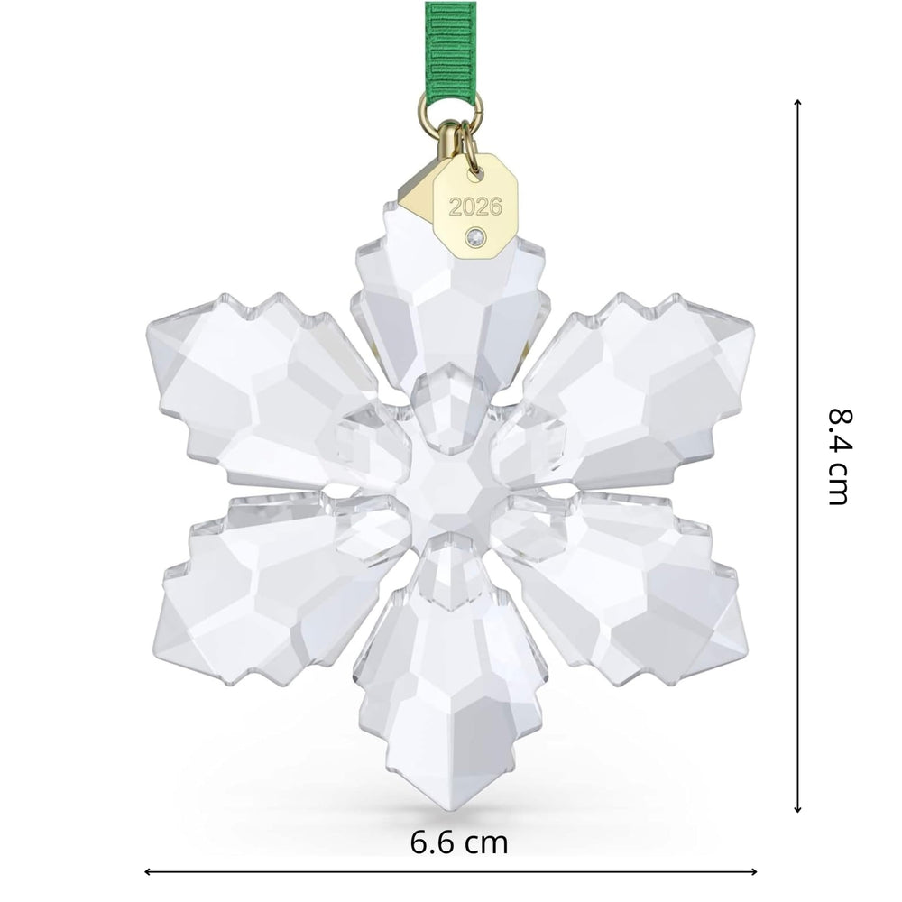 Swarovski green grosgrain ribbon and gold-tone year tag showing collectible detail benefit