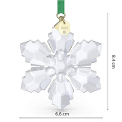Swarovski green grosgrain ribbon and gold-tone year tag showing collectible detail benefit