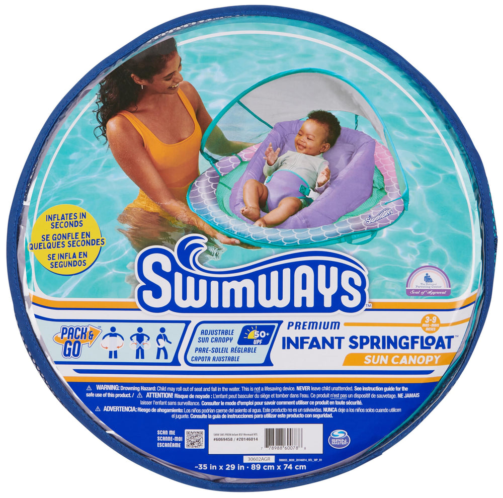 SwimWays float next to infant for scale, clear size and seat fit