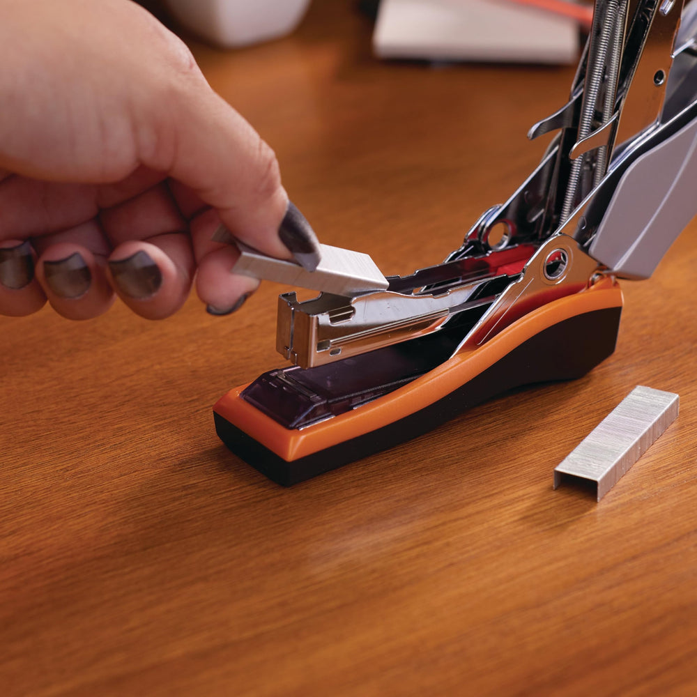 Swingline Optima 40 stapling a thick paper stack demonstrating 40-sheet capacity