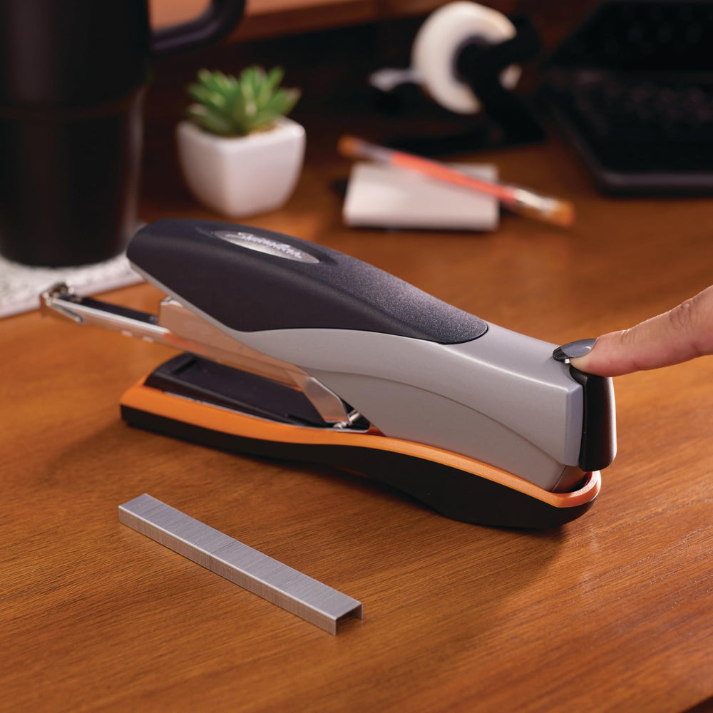 Swingline Optima 40 stapling action in use on thick stack benefit: secures up to 40 sheets