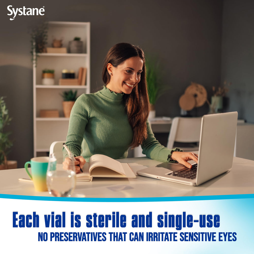Hand holding Systane vials to show size and convenient portability