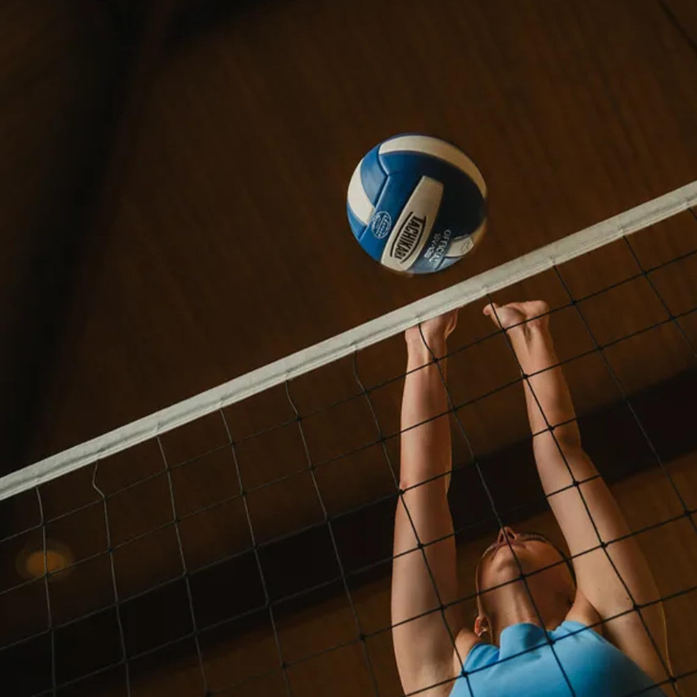 Tachikara SV18S on gym court conveying institutional durability and readiness for heavy play