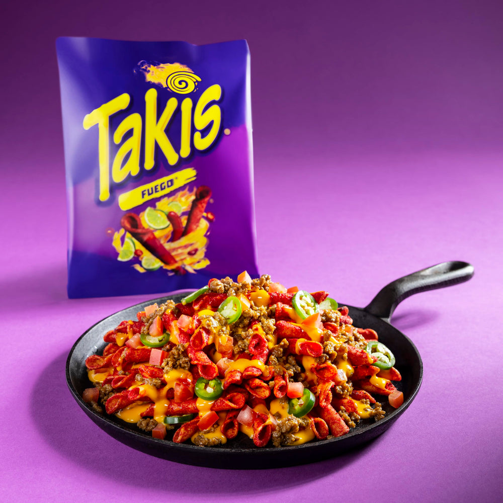 Takis bag in backpack scale demonstrating portability and travel convenience