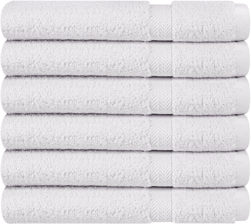 T & L Towel and Linen Mart white towel on bathroom rack conveying clean look