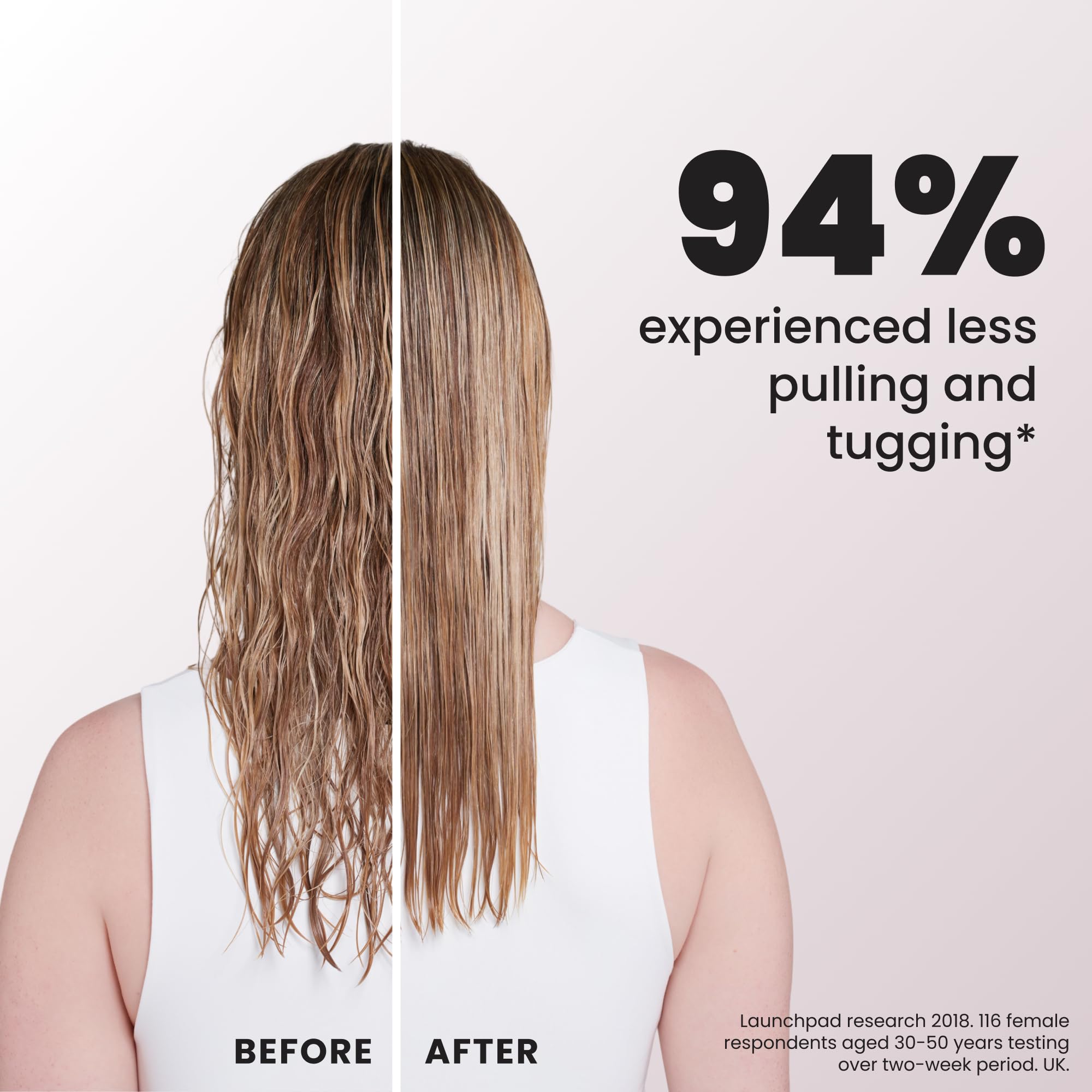 TANGLE TEEZER brushing through conditioner to distribute product evenly, silky result