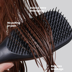 TANGLE TEEZER in hand detangling wet hair for smooth, less-damaging strokes