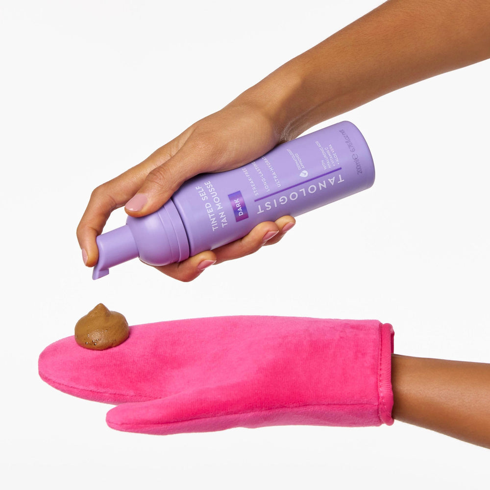 Tanologist pack shot with open cap showing clear formula and transfer-proof promise