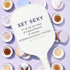 tarte powder on fluffy brush ready to apply, demonstrates creaseless application