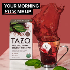 TAZO Awake tea bag close-up with tag highlighting premium blend and convenience