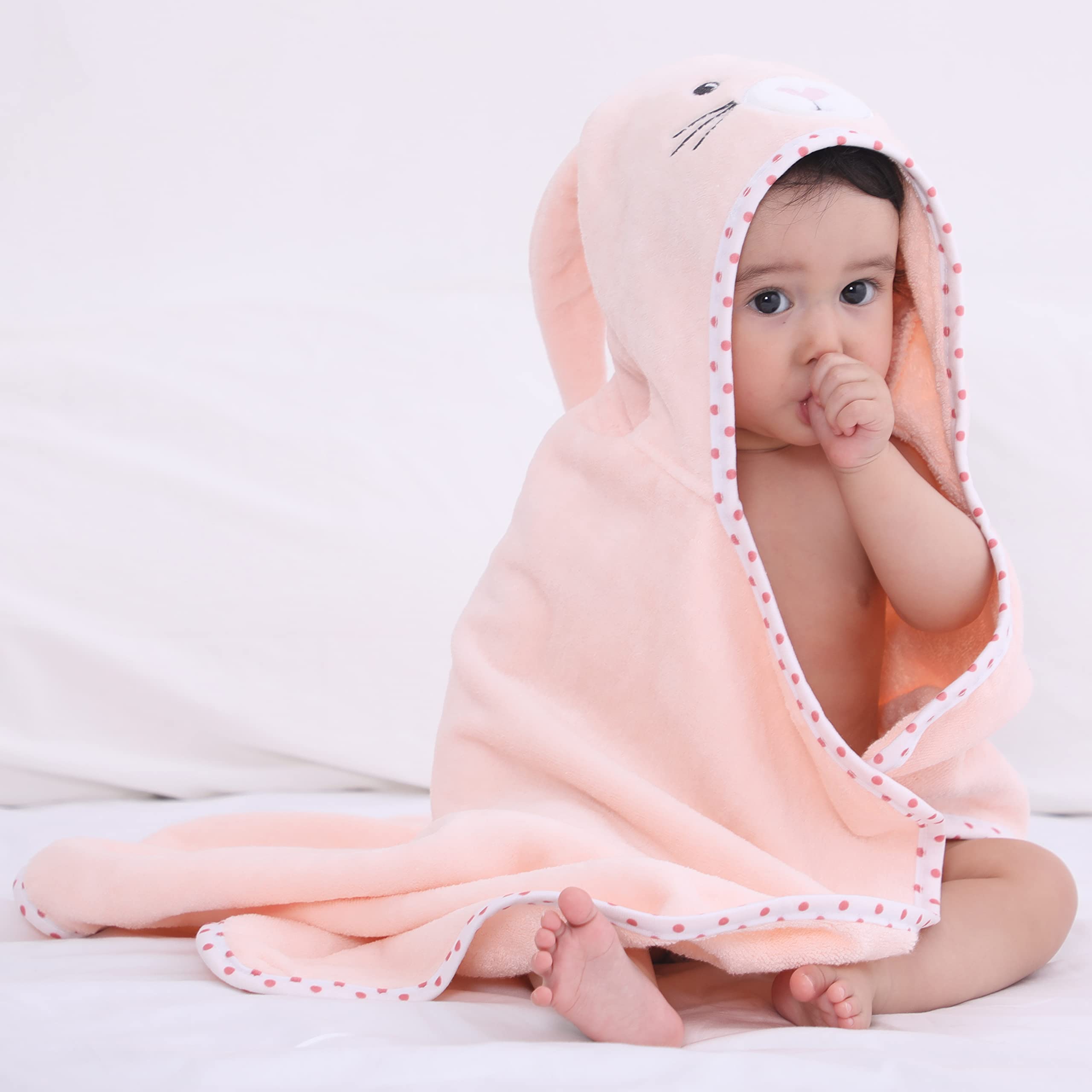 TBEZY baby wrapped after bath demonstrating warm comfortable wrap
