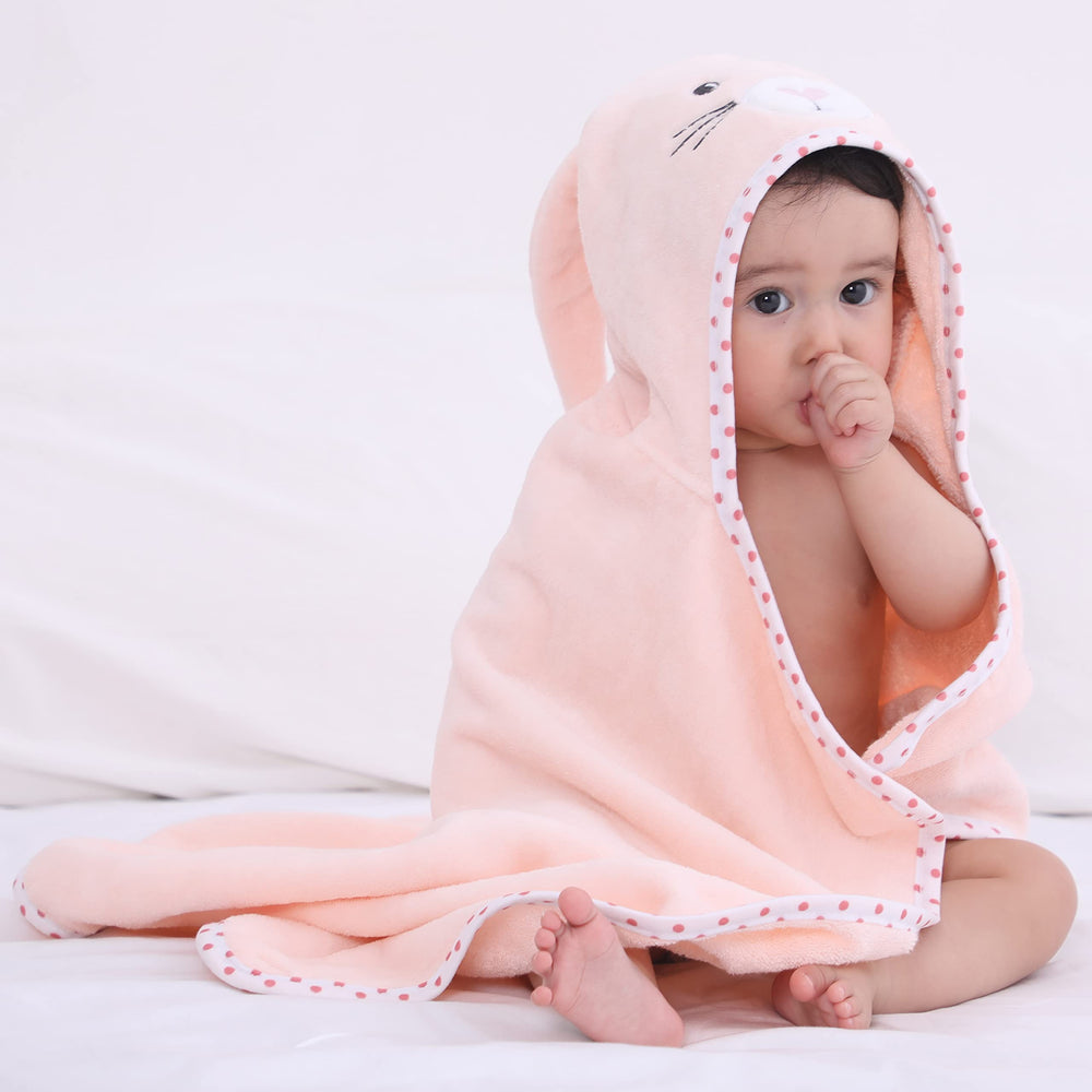 TBEZY baby wrapped after bath demonstrating warm comfortable wrap