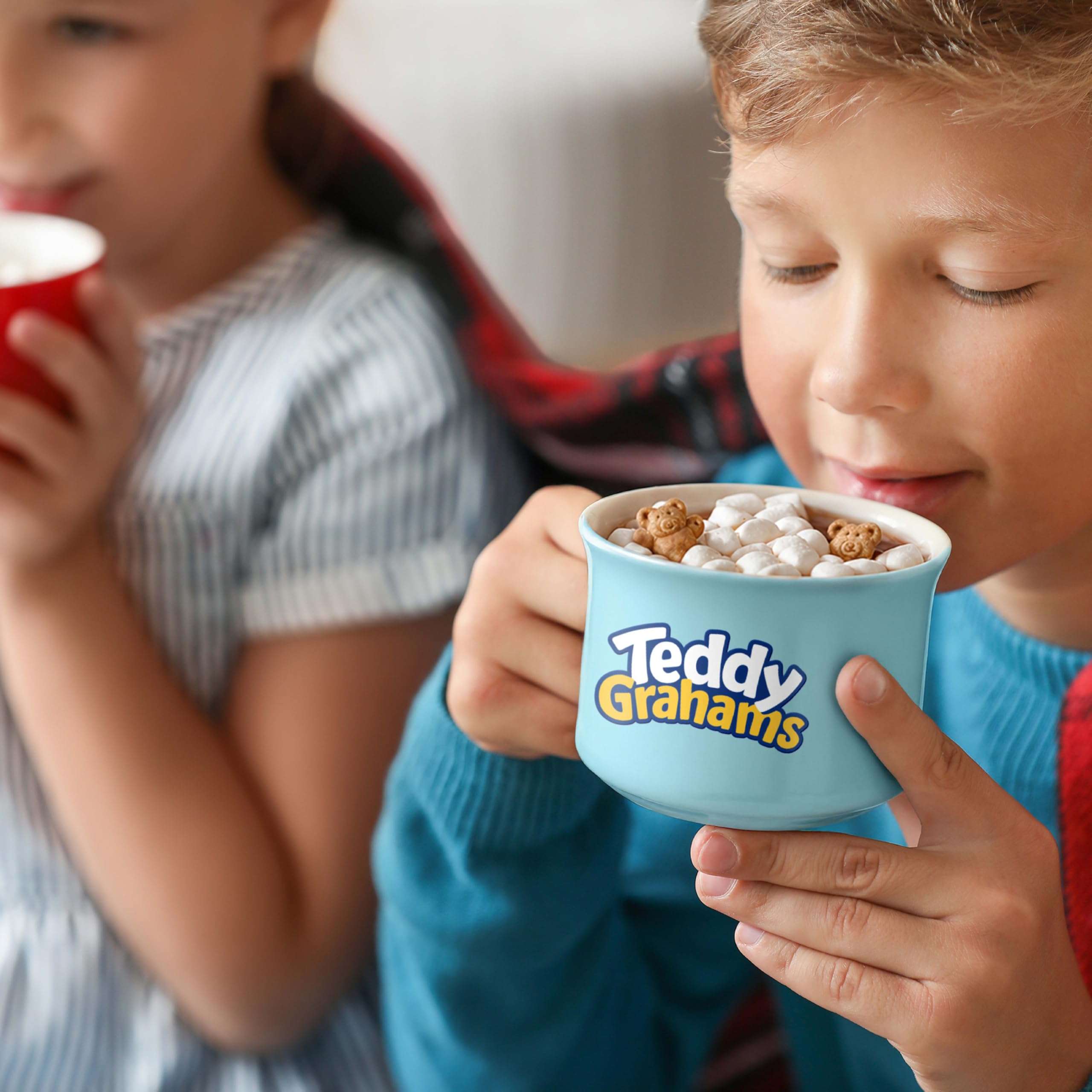 Teddy Grahams next to ruler showing box and cookie scale