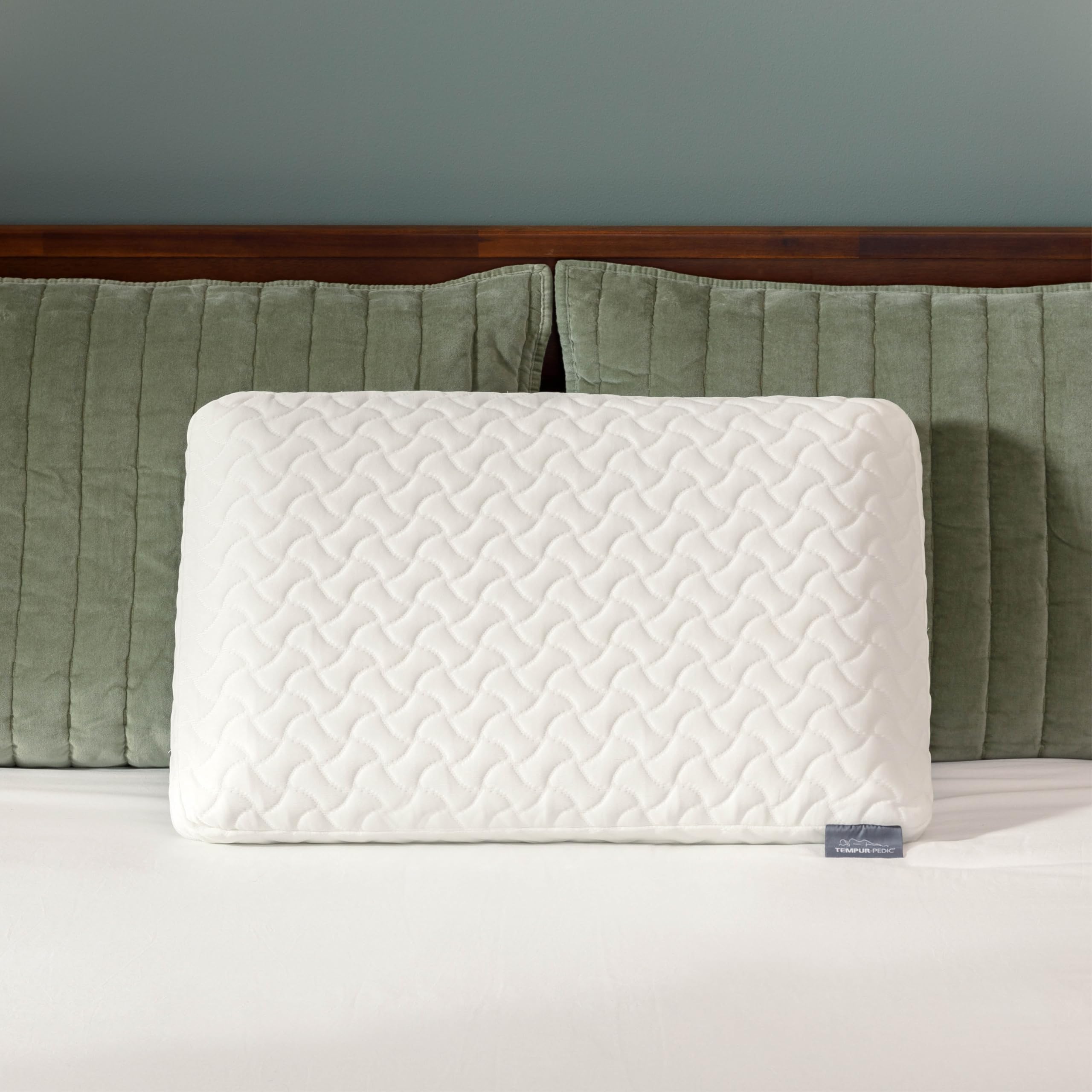 Tempur-Pedic pillows in a cozy bedroom to show lifestyle comfort benefit