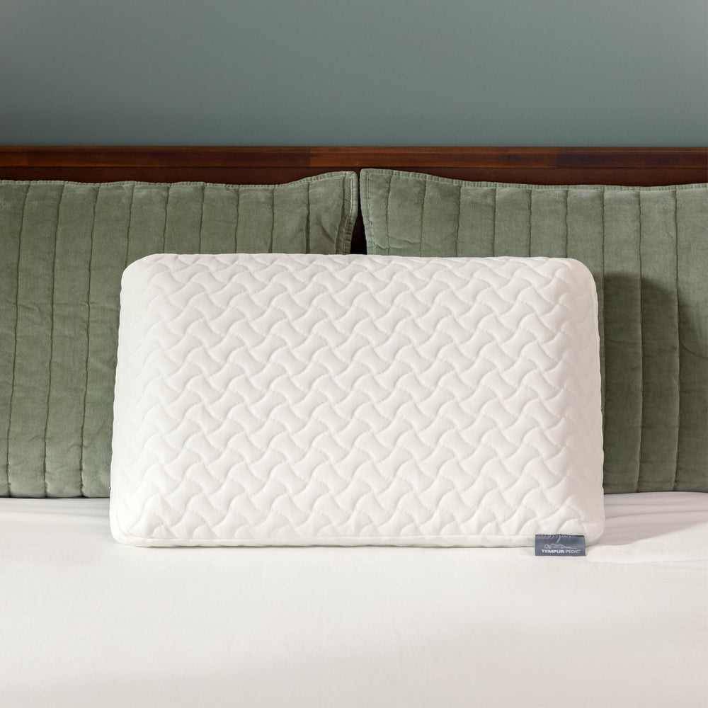 Tempur-Pedic pillows in a cozy bedroom to show lifestyle comfort benefit