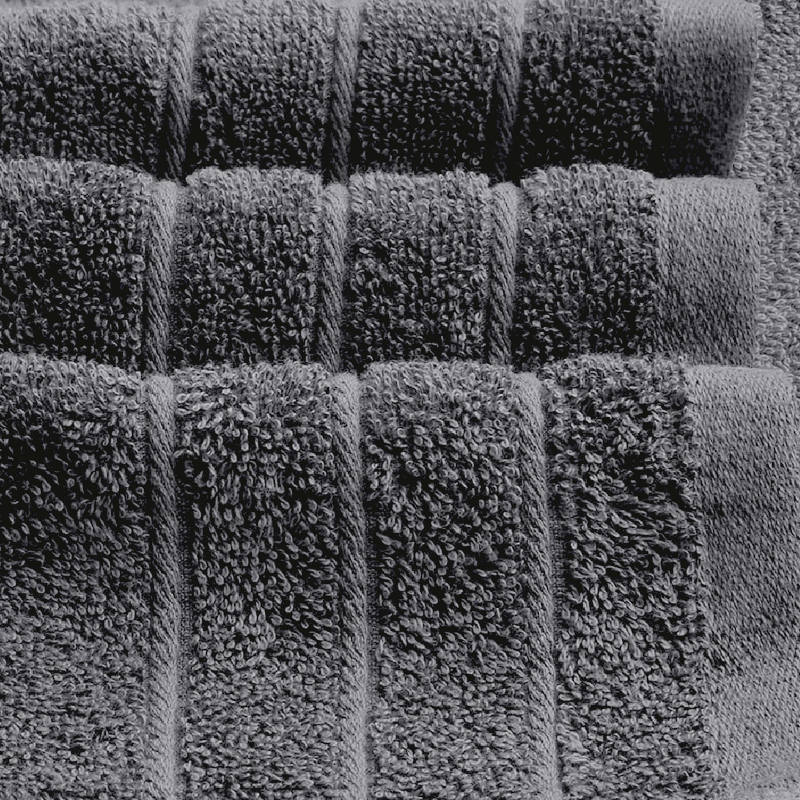 Tens Towels hanging on bathroom rack illustrating quick-dry benefit