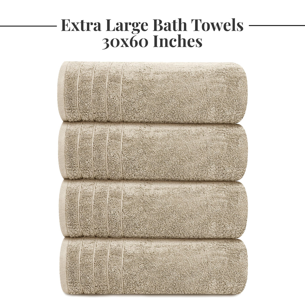 Tens Towels held by person illustrating 30 x 60 inch generous size