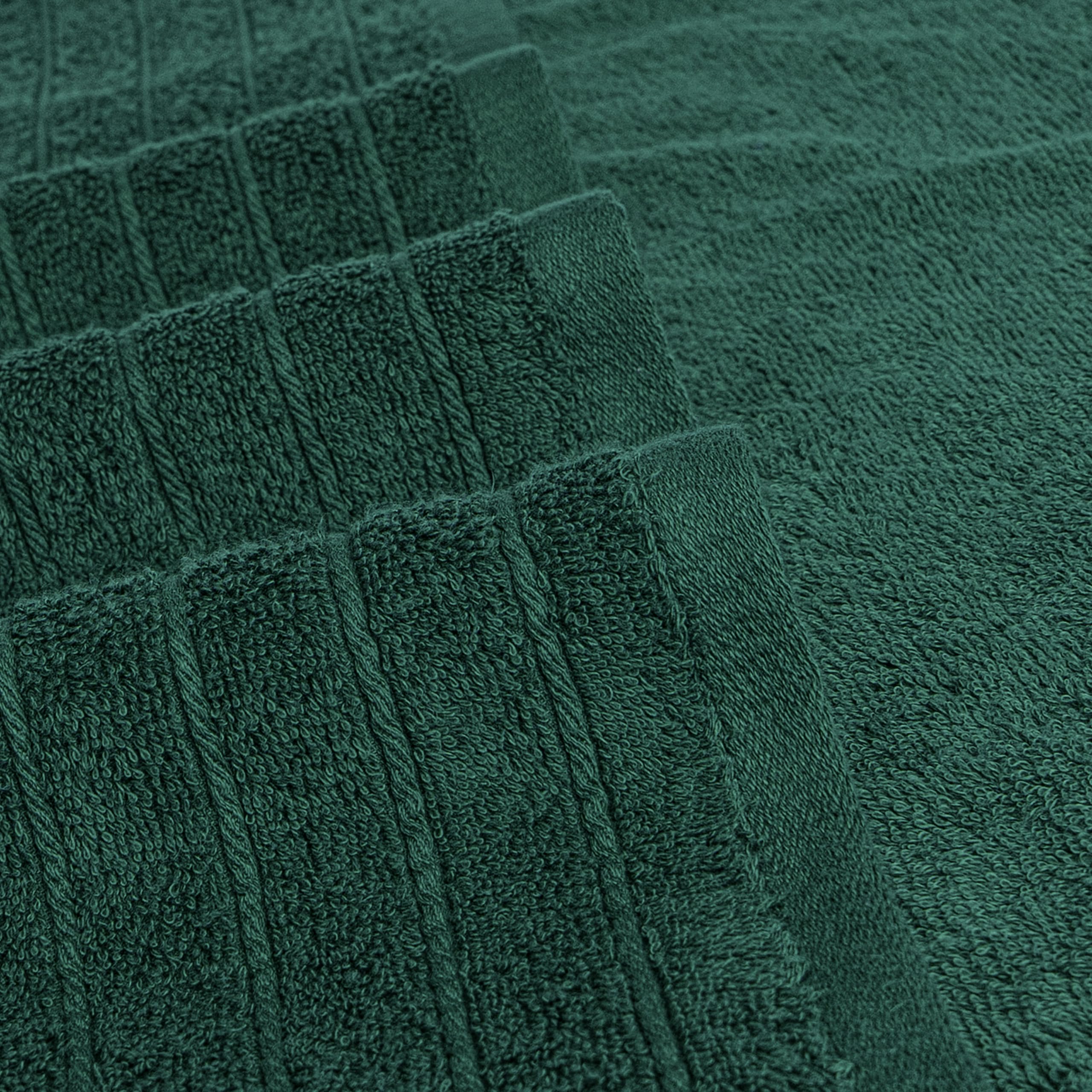 Tens Towels held by person to show 30x60 inch scale and full-body coverage benefit