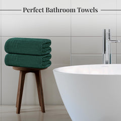 Tens Towels stacked four-pack emphasizing included quantity and guest-ready convenience benefit