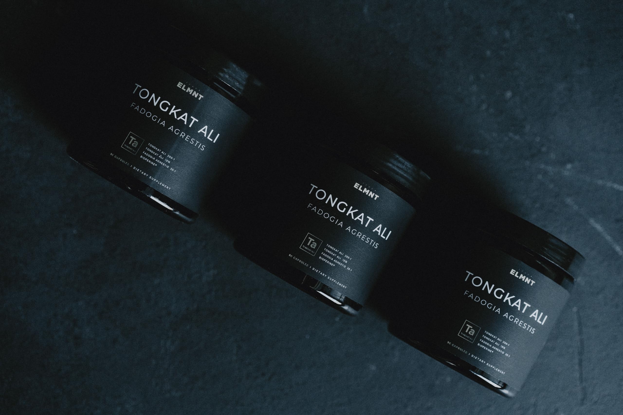 TERRA ELMNT capsules on gym bench depicting use with exercise and energy focus