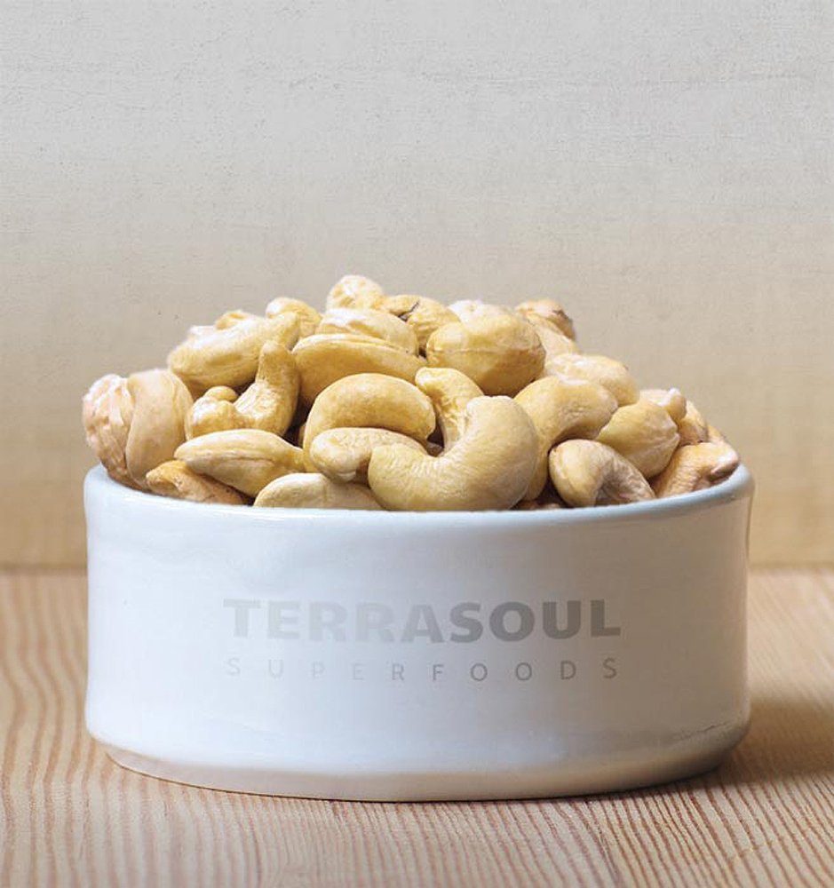 Terrasoul Superfoods bag next to measuring cup displaying 2 lb size for portion planning