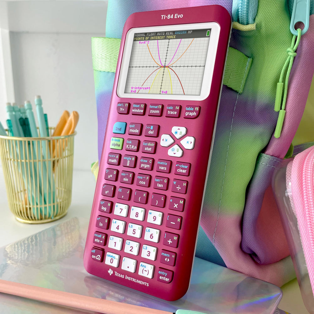 Texas Instruments TI-84 Evo held in hand to show compact size and easy portability