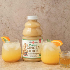 Bottle beside a bowl of marinade being mixed to show The Ginger People juice enhancing recipes fast