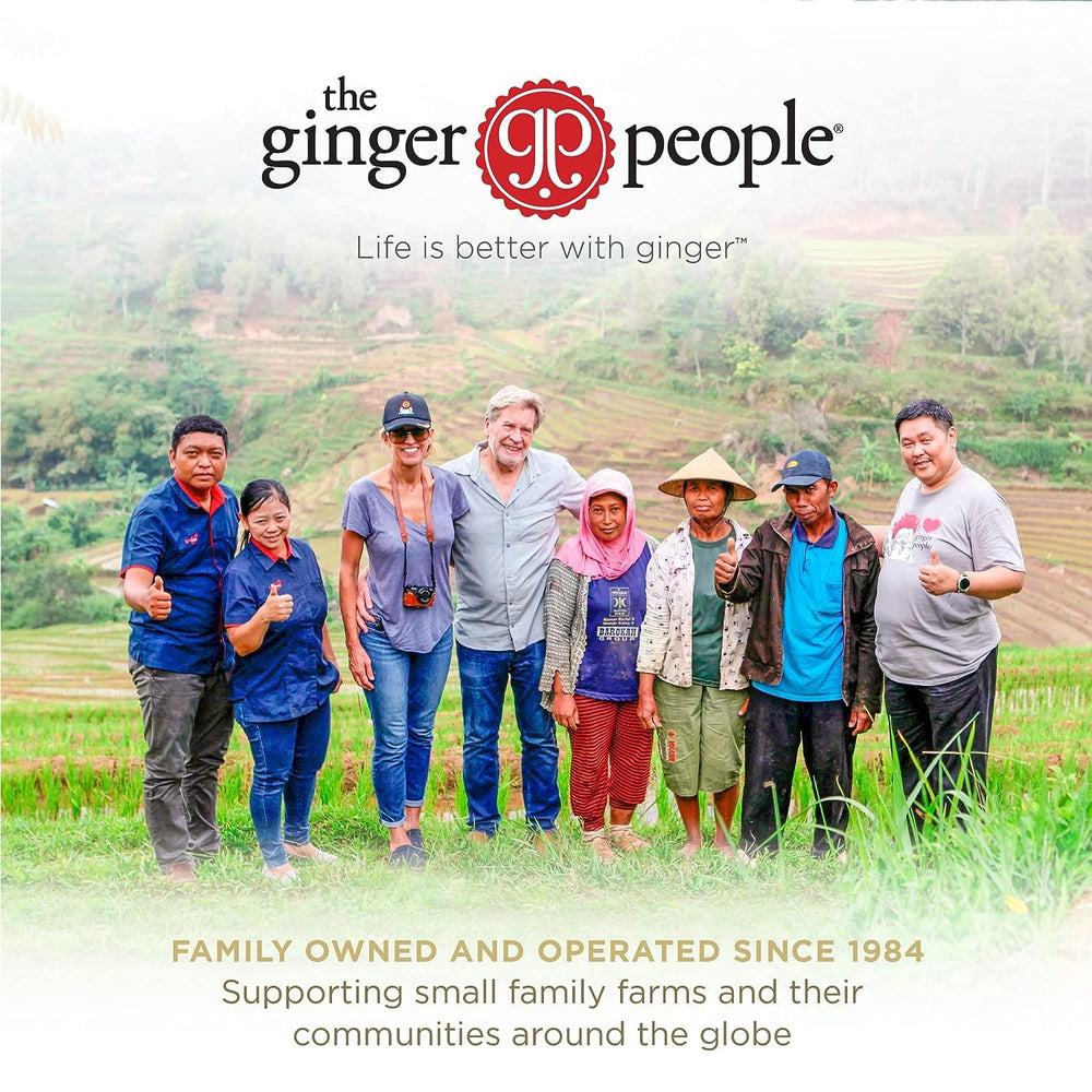 Hand holding the 32 fl oz bottle of The Ginger People to show scale and time-saving quantity