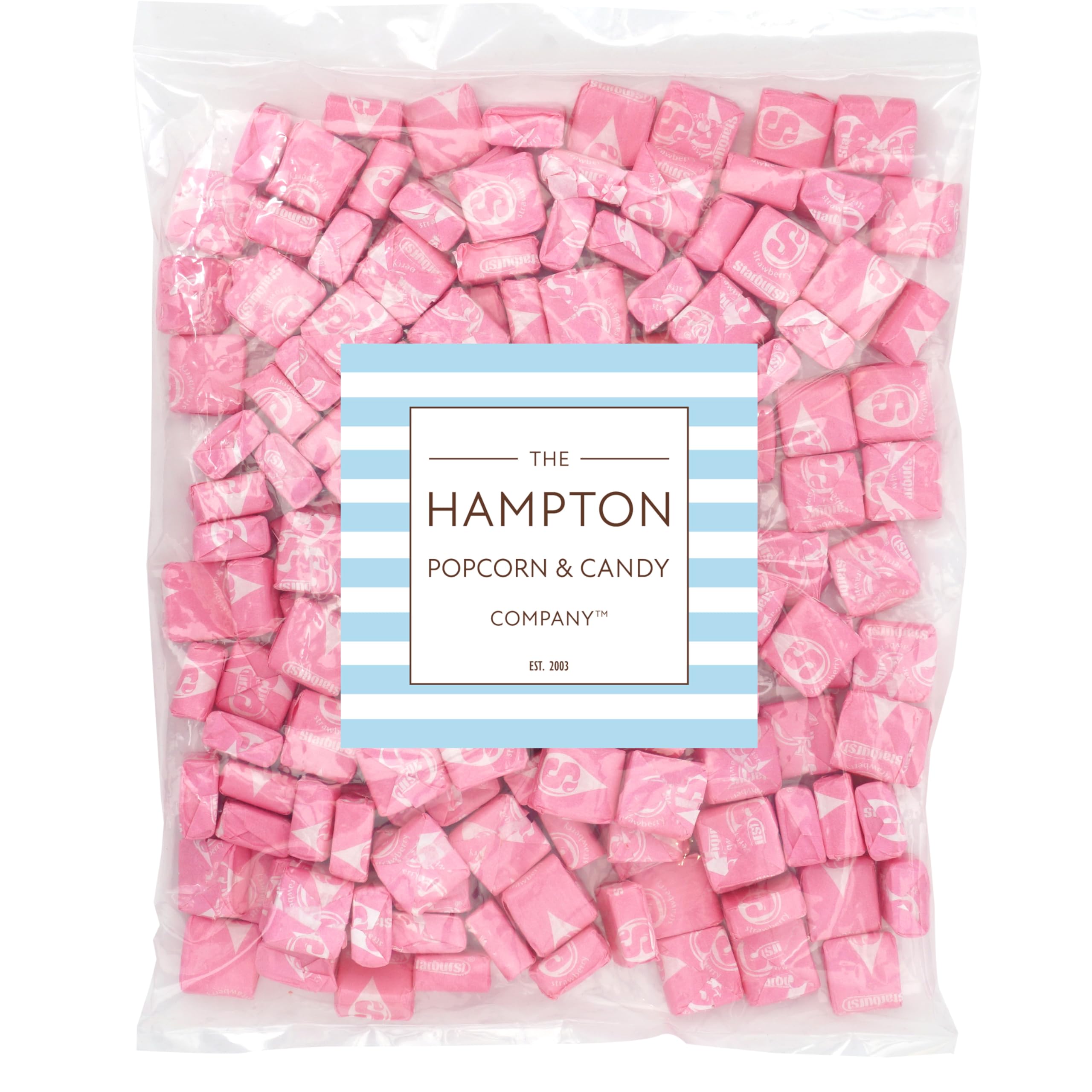 Close-up of individually wrapped Starburst All Pink pieces showing THE HAMPTON CANDY COMPANY freshness seal