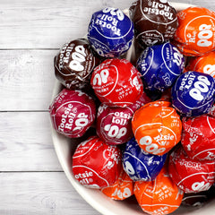 The Hampton Popcorn Company individually wrapped lollipop detail for hygiene and portability benefit