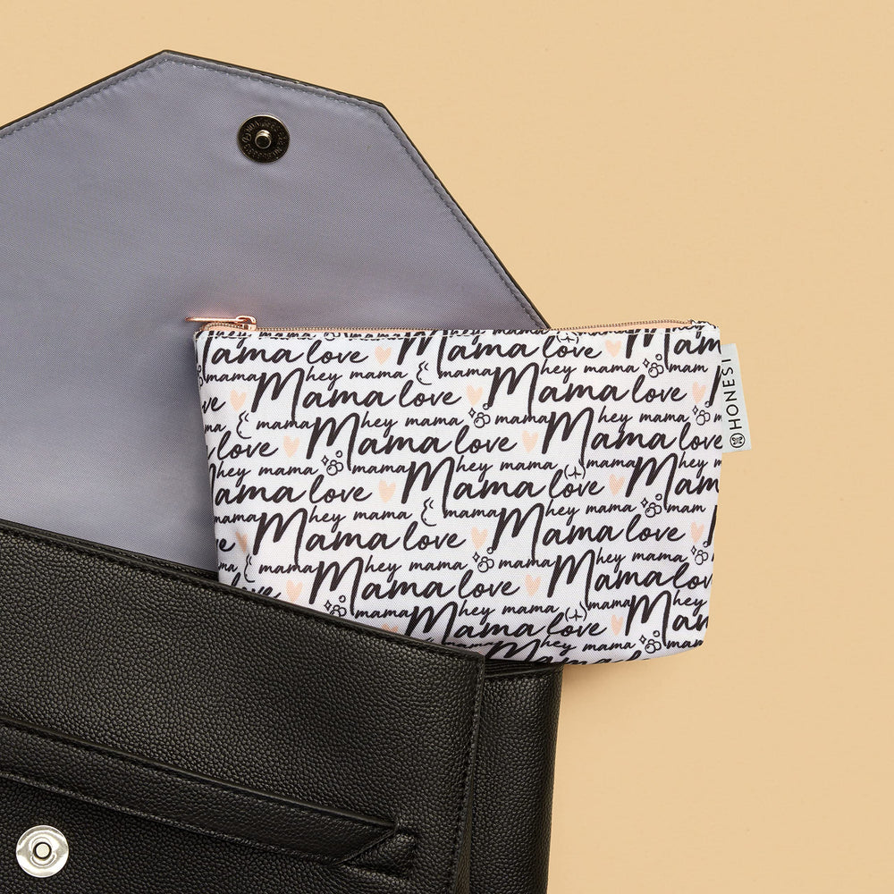 The Honest Company products laid out flat to show complete postpartum trio