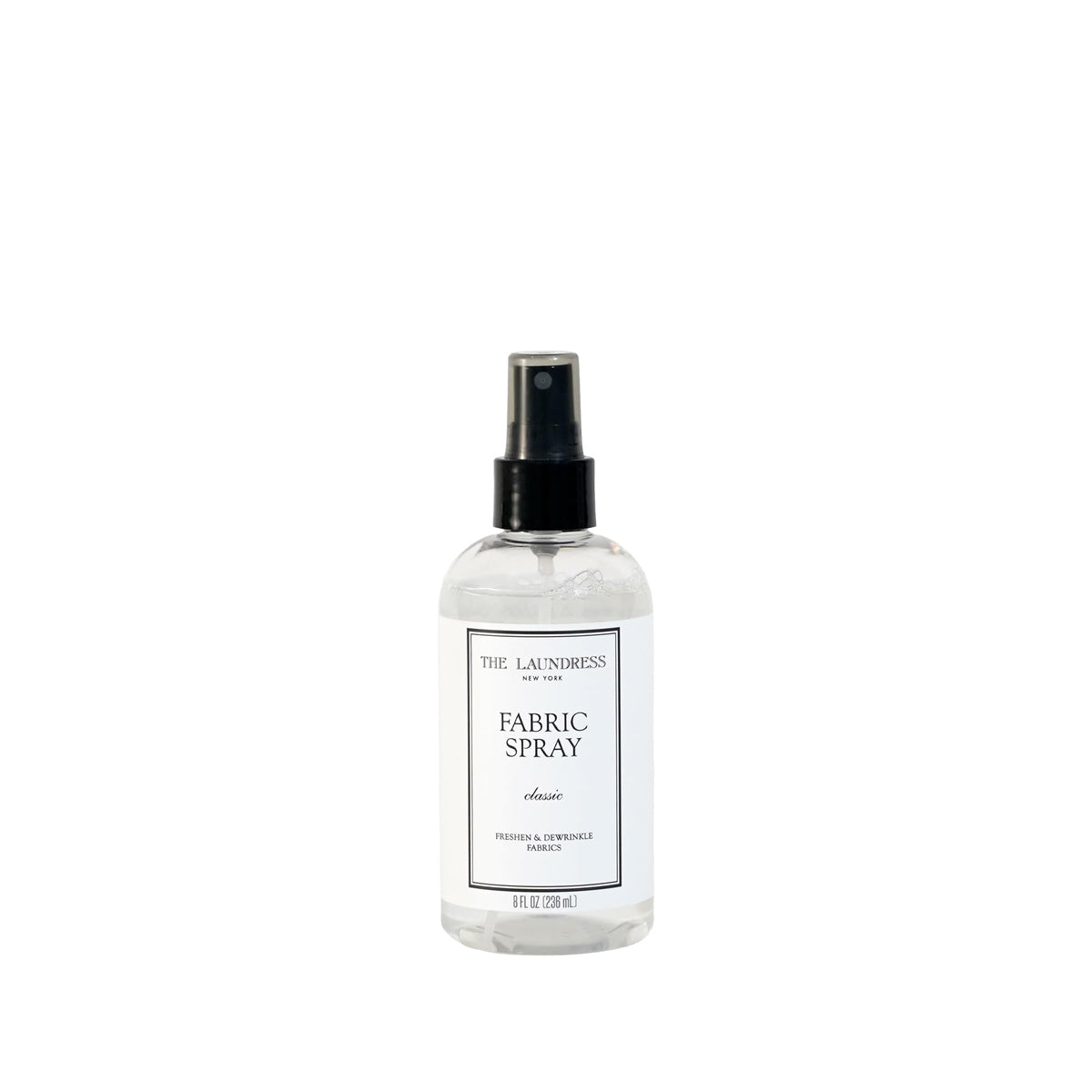 The Laundress front bottle view showing label and elegant packaging benefit: clear product ID